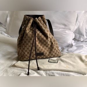 GUCCI Monogram Drawstring Backpack Dark Brown